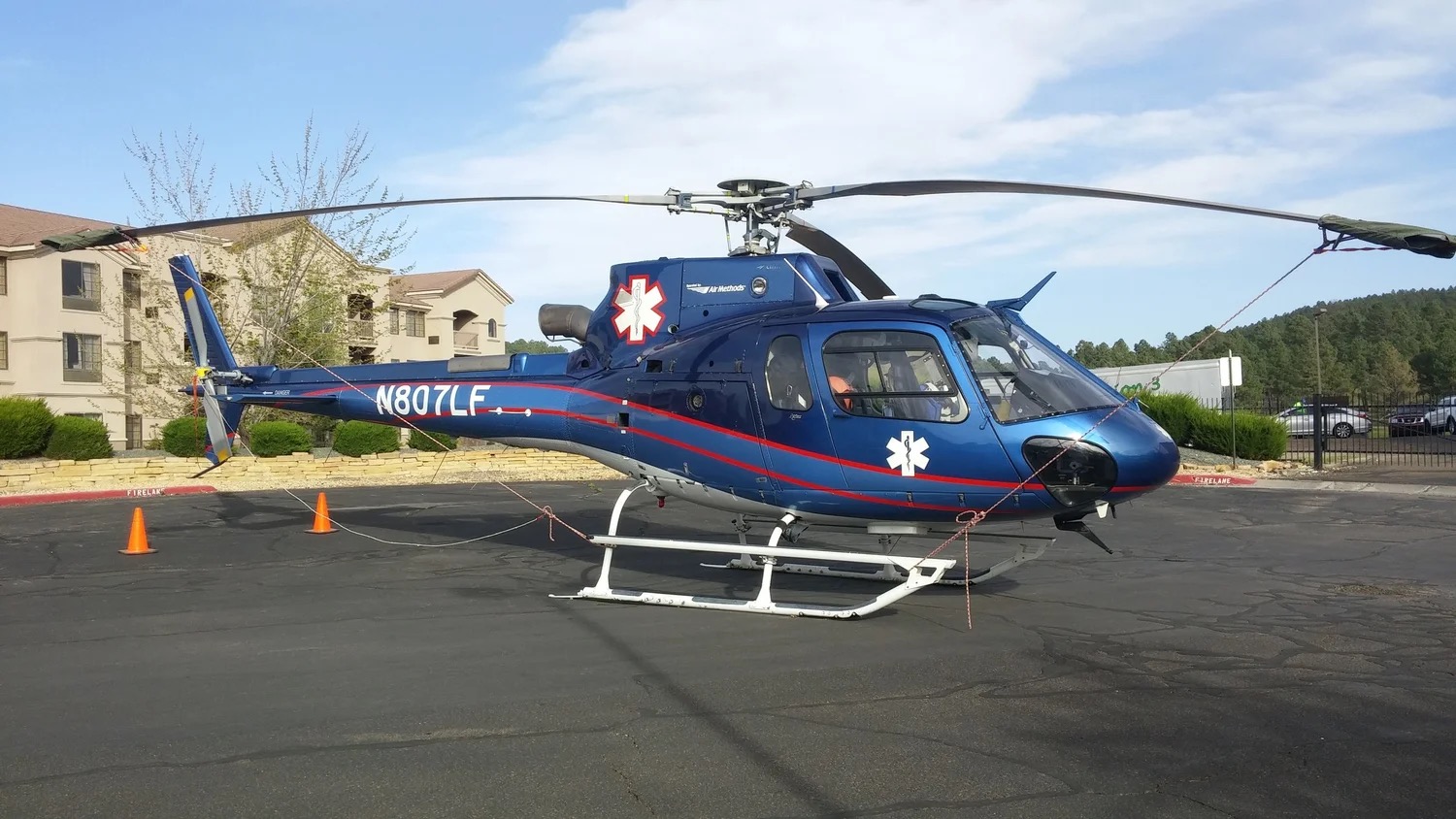An Air Methods medical helicopter parked outside the building — the Exhibit Hall’s roll-up load-in door is sized for vehicles up to helicopters.