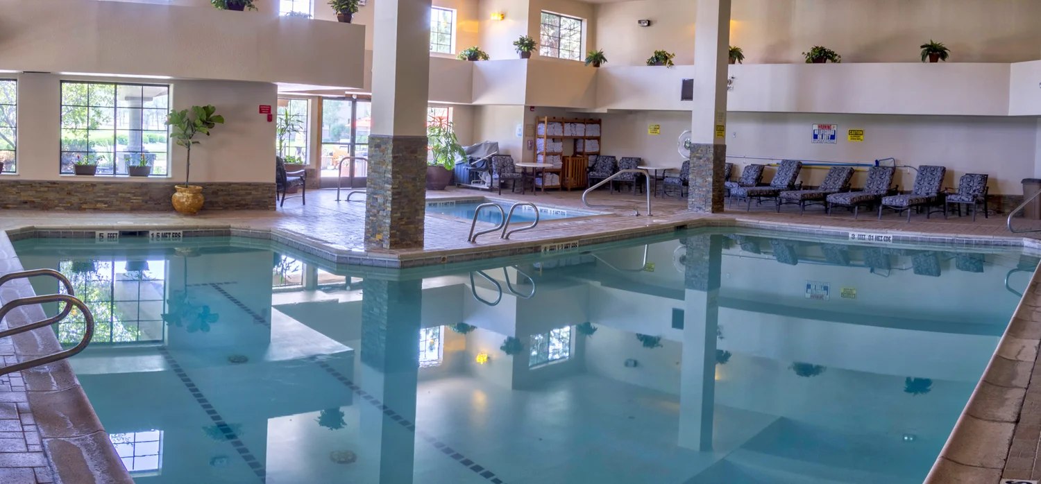The pool and hot tub area at MCM Eleganté Lodge & Resort.